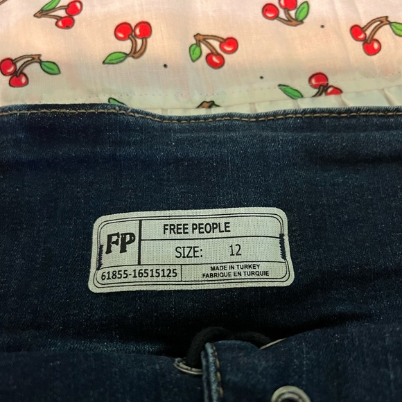 Free People blue Jean skirt.  Size 12.  Tie and lace up in the middle. - Picture 4 of 6